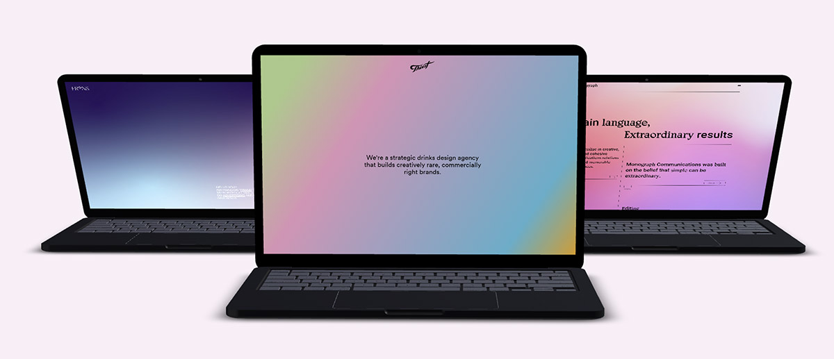 Three laptops demonstrating gradient backgrounds